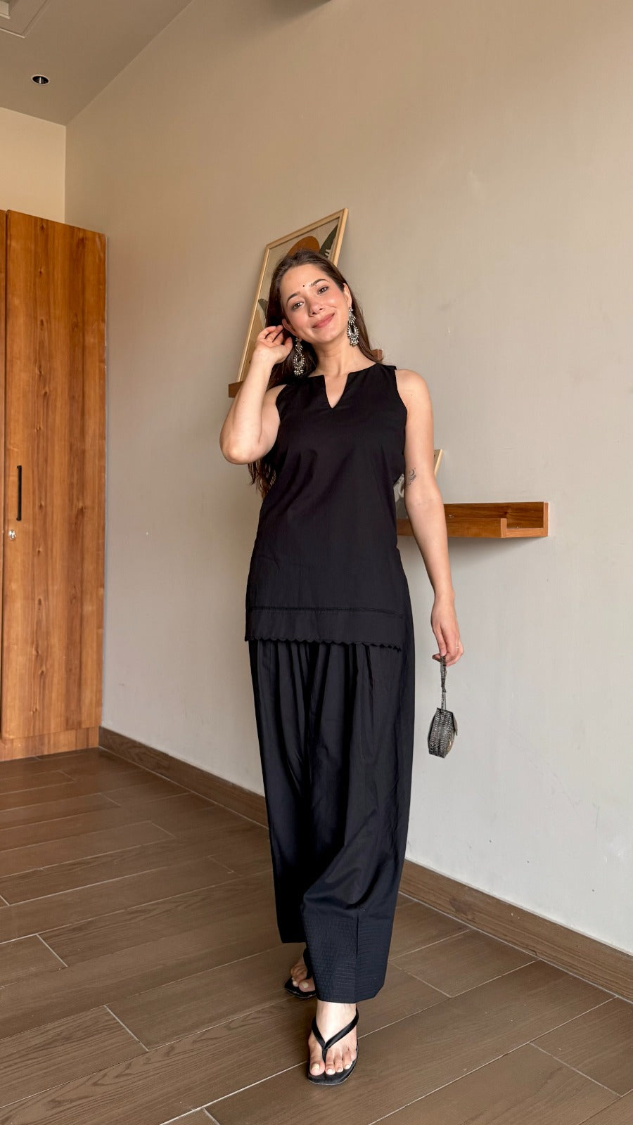 Bairani Women Black Solid Sleeveless Kurta with Salwar